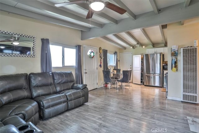 26737 Cypress St, Highland, CA 92346 - living area with a heating unit, ceiling fan, plenty of natural light, and light wood-style floors