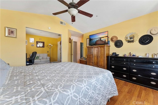 13519 Fremont St, Fontana, CA 92336 - bedroom featuring lofted ceiling, wood finished floors, and a ceiling fan