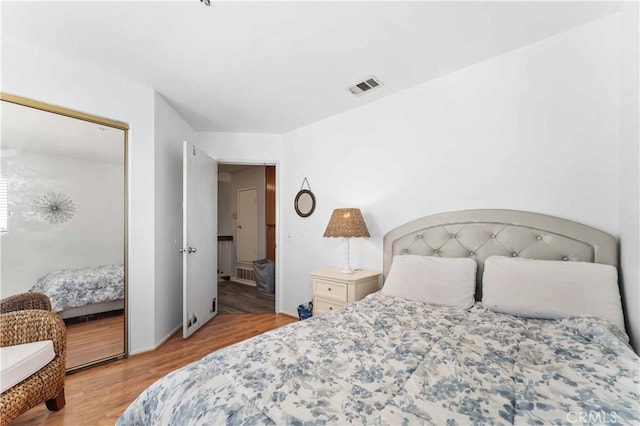 13519 Fremont St, Fontana, CA 92336 - bedroom featuring light wood finished floors and a closet