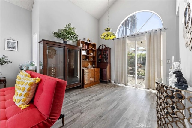 13519 Fremont St, Fontana, CA 92336 - living area with high vaulted ceiling and wood finished floors