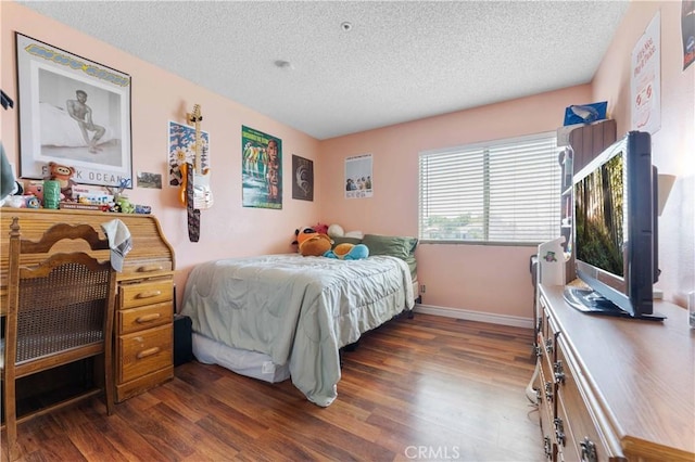 13519 Fremont St, Fontana, CA 92336 - bedroom with wood finished floors and a textured ceiling