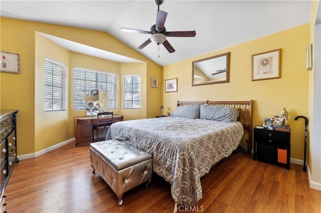 13519 Fremont St, Fontana, CA 92336 - bedroom with wood finished floors, vaulted ceiling, and a ceiling fan