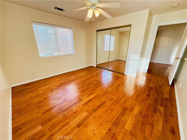 14542 Los Robles Ave, Hacienda Heights, CA 91745 - unfurnished bedroom with wood finished floors, a closet, and ceiling fan