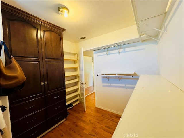 14542 Los Robles Ave, Hacienda Heights, CA 91745 - walk in closet featuring dark wood finished floors