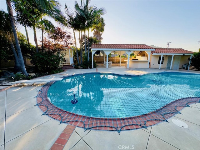 14542 Los Robles Ave, Hacienda Heights, CA 91745 - view of pool with exterior kitchen and a patio area