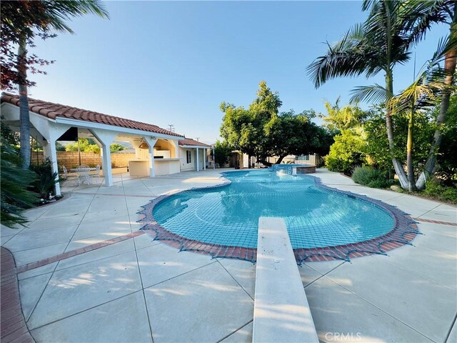 14542 Los Robles Ave, Hacienda Heights, CA 91745 - view of swimming pool featuring a patio and a diving board