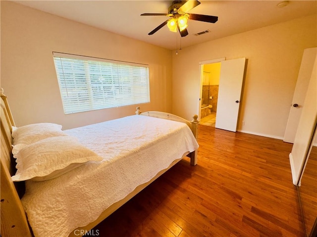 14542 Los Robles Ave, Hacienda Heights, CA 91745 - bedroom featuring wood finished floors, connected bathroom, and a ceiling fan