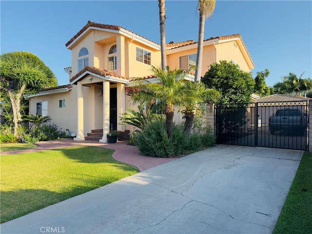 14542 Los Robles Ave, Hacienda Heights, CA 91745 - mediterranean / spanish home featuring a gate, a tile roof, stucco siding, and a front yard