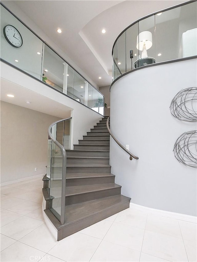 2637 Via Olivera, Palos Verdes Estates, CA 90274 - staircase featuring recessed lighting, baseboards, tile patterned floors, and a high ceiling