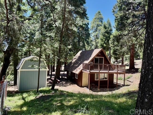21803 Crestline Rd, Palomar Mountain, CA 92060 - back of property featuring a shed, a wooden deck, and a yard