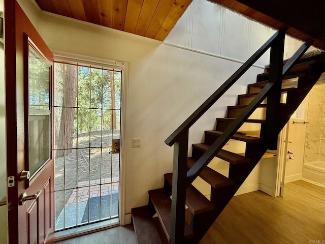 21803 Crestline Rd, Palomar Mountain, CA 92060 - staircase with wood finished floors, wooden ceiling, and baseboards