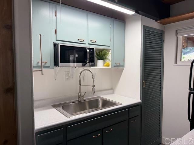 21803 Crestline Rd, Palomar Mountain, CA 92060 - kitchen featuring stainless steel microwave and light countertops