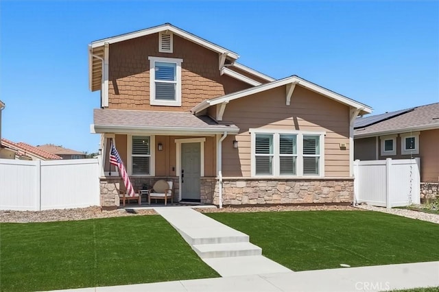 3981 Savannah Ln, Piru, CA 93040 - view of front facade with covered porch, stone siding, and a shingled roof