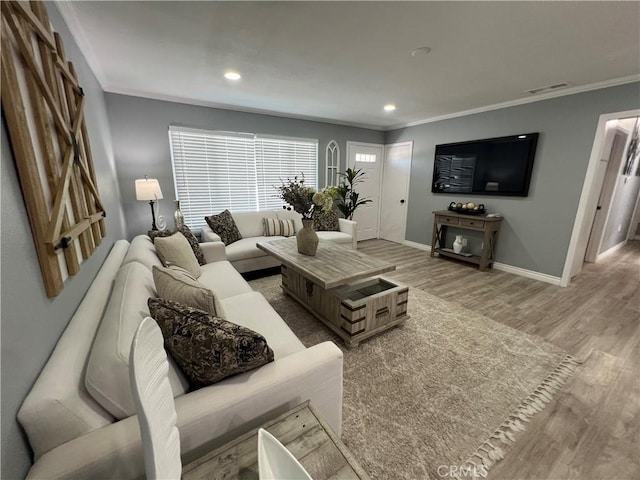 14726 Osage Rd, Apple Valley, CA 92307 - living room with ornamental molding, wood finished floors, and recessed lighting