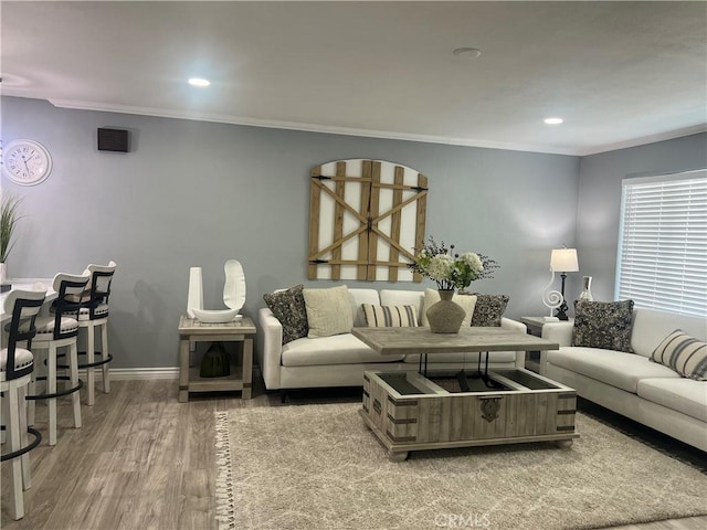 14726 Osage Rd, Apple Valley, CA 92307 - living area featuring crown molding, wood finished floors, and recessed lighting