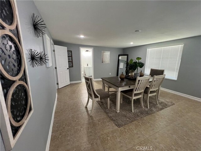 14726 Osage Rd, Apple Valley, CA 92307 - tiled dining area with recessed lighting and baseboards
