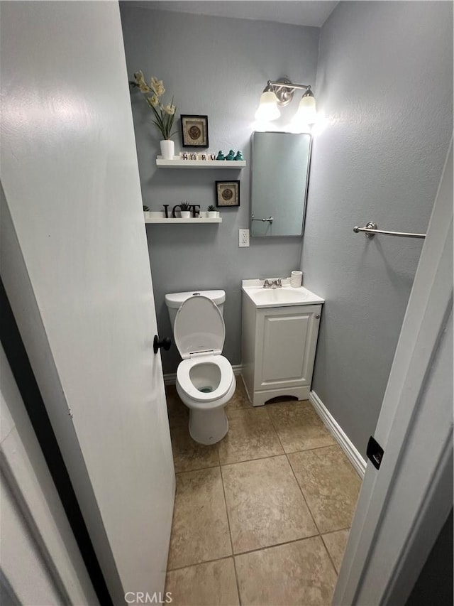 14726 Osage Rd, Apple Valley, CA 92307 - half bath with tile patterned flooring and vanity