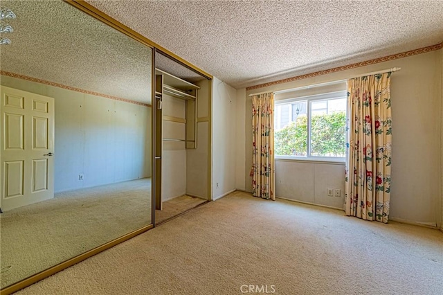 1736 Island Dr, Fullerton, CA 92833 - unfurnished bedroom with carpet, a closet, and a textured ceiling