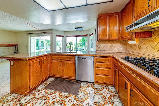 1736 Island Dr, Fullerton, CA 92833 - kitchen featuring dishwasher, a sink, a peninsula, under cabinet range hood, and black gas stovetop