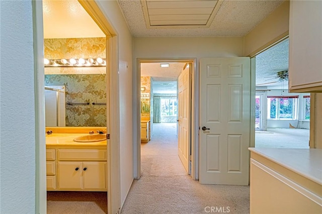 1736 Island Dr, Fullerton, CA 92833 - corridor with light carpet and a sink