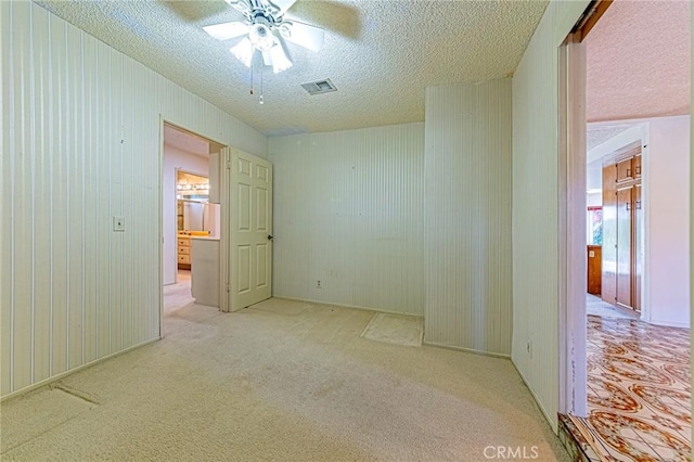 1736 Island Dr, Fullerton, CA 92833 - unfurnished bedroom with carpet floors, a textured ceiling, and a ceiling fan