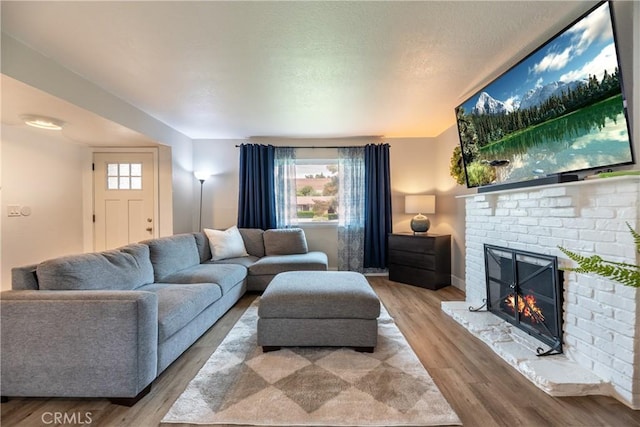 20869 Moonlake St, Walnut, CA 91789 - living room with a fireplace and wood finished floors