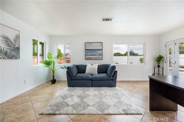 20869 Moonlake St, Walnut, CA 91789 - living area featuring light tile patterned floors and french doors