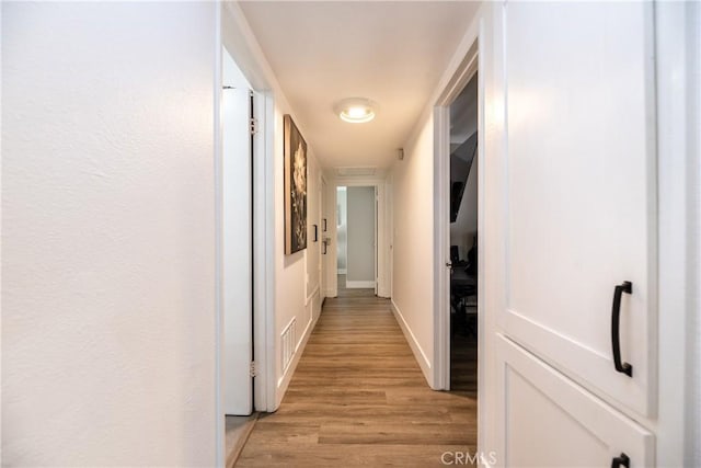 20869 Moonlake St, Walnut, CA 91789 - hallway featuring light wood-style floors and baseboards