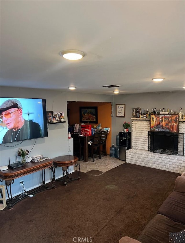 16784 Samgerry Dr, La Puente, CA 91744 - carpeted living area with tile patterned flooring and a brick fireplace