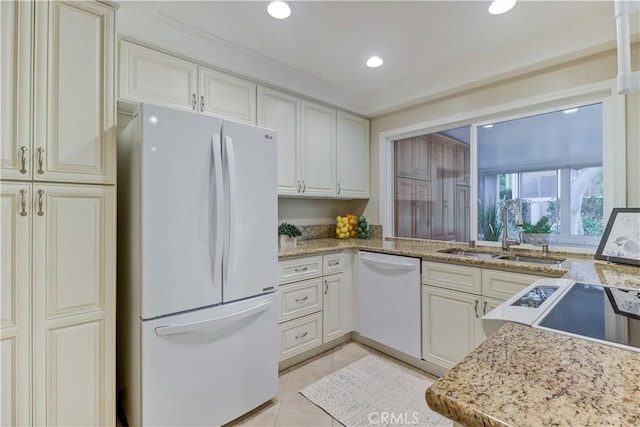 5341 Bahia Blanca W Unit C, Laguna Woods, CA 92637 - kitchen with white appliances, light tile patterned floors, recessed lighting, light stone counters, and cream cabinetry