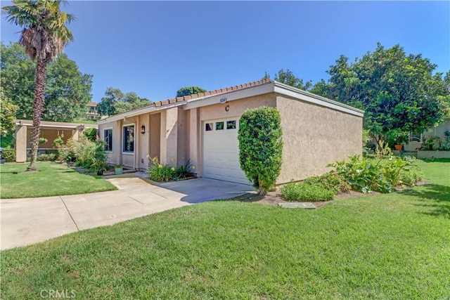 5341 Bahia Blanca W Unit C, Laguna Woods, CA 92637 - view of front facade with stucco siding, an attached garage, driveway, and a front yard