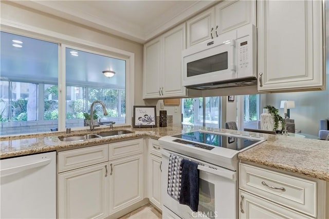 5341 Bahia Blanca W Unit C, Laguna Woods, CA 92637 - kitchen featuring white appliances, healthy amount of natural light, and light stone countertops