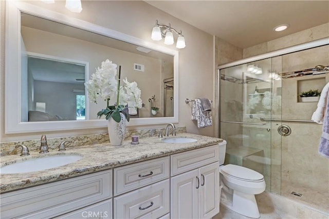 5341 Bahia Blanca W Unit C, Laguna Woods, CA 92637 - full bathroom with double vanity and a stall shower