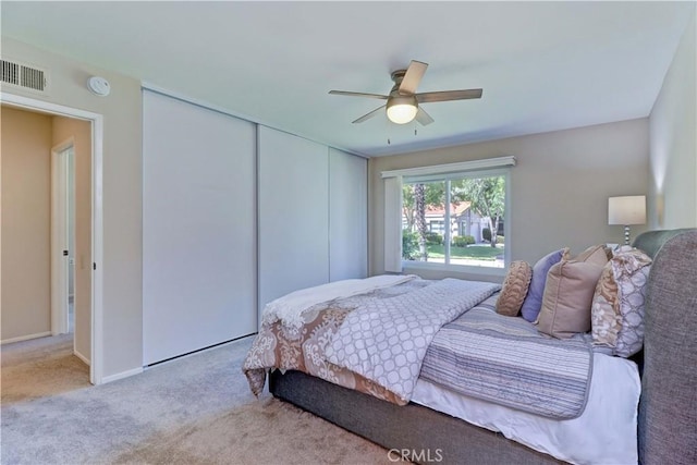 5341 Bahia Blanca W Unit C, Laguna Woods, CA 92637 - bedroom featuring carpet flooring, a closet, and ceiling fan