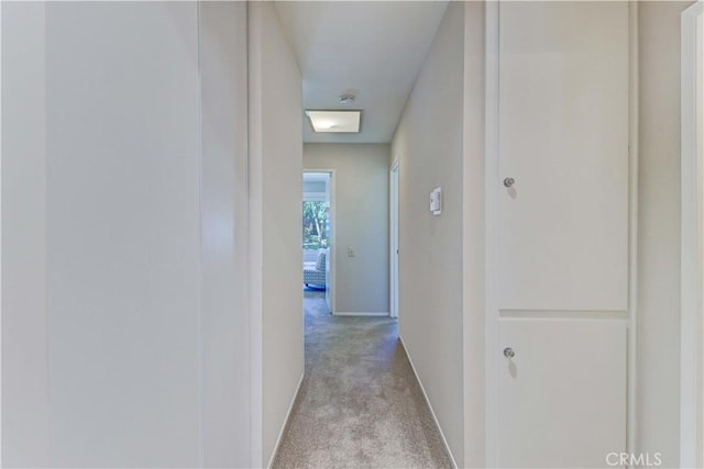 5341 Bahia Blanca W Unit C, Laguna Woods, CA 92637 - hallway featuring light colored carpet and baseboards
