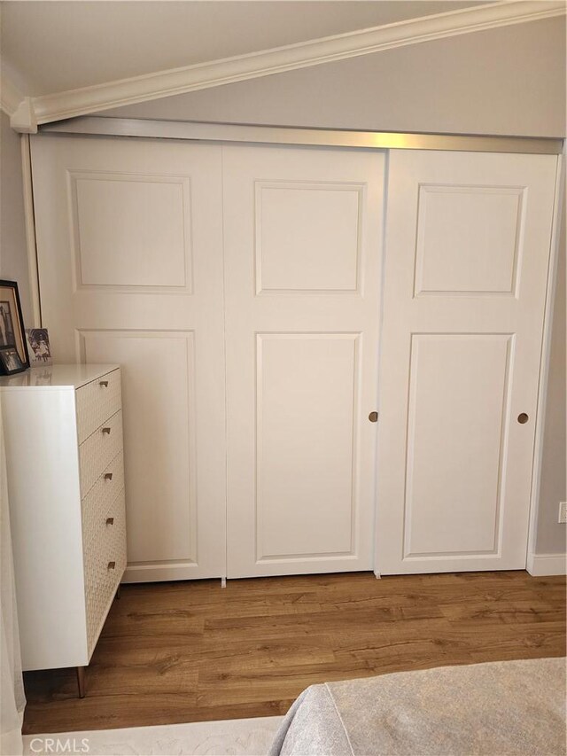 5461 W Palmer Dr, Banning, CA 92220 - bedroom with crown molding and wood finished floors