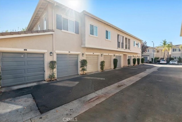 26426 Arboretum Way Unit 806, Murrieta, CA 92563 - view of street with street lights and a residential view