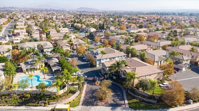 26426 Arboretum Way Unit 806, Murrieta, CA 92563 - aerial perspective of suburban area featuring a pool and a mountainous background