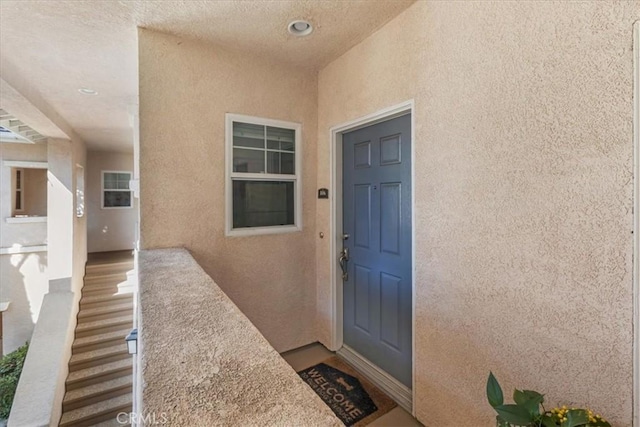 26426 Arboretum Way Unit 806, Murrieta, CA 92563 - view of exterior entry featuring stucco siding