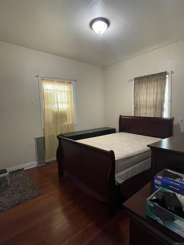 425 N Westlake Ave, Los Angeles, CA 90026 - bedroom featuring dark wood-style floors and baseboards