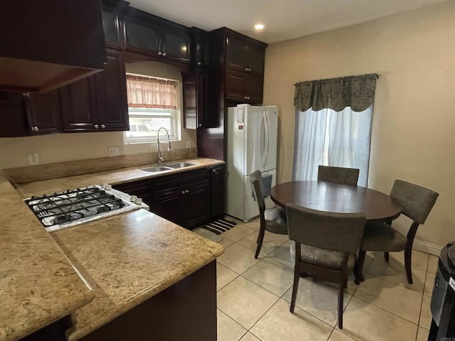 425 N Westlake Ave, Los Angeles, CA 90026 - kitchen with a sink, freestanding refrigerator, light tile patterned floors, and recessed lighting