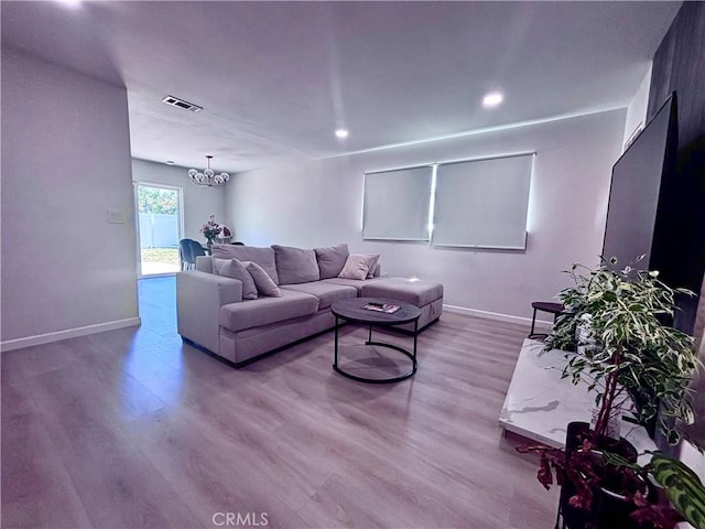 2969 Crestwood Pl, Riverside, CA 92503 - living room featuring wood finished floors, baseboards, a chandelier, and recessed lighting