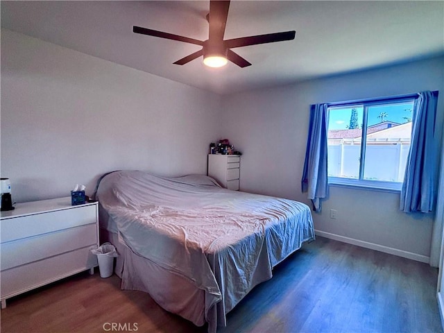 2969 Crestwood Pl, Riverside, CA 92503 - bedroom with wood finished floors, ceiling fan, and baseboards