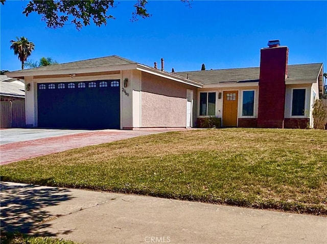 2969 Crestwood Pl, Riverside, CA 92503 - ranch-style house featuring an attached garage, a chimney, a front lawn, driveway, and stucco siding