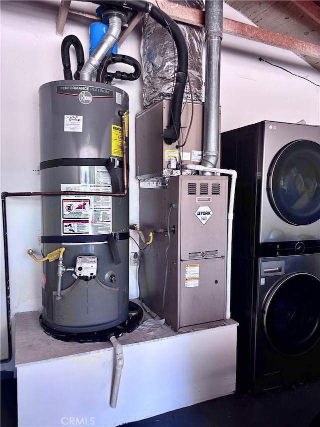 2969 Crestwood Pl, Riverside, CA 92503 - utility room with stacked washer / dryer and strapped water heater
