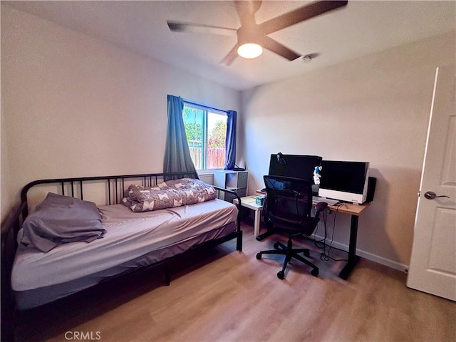 2969 Crestwood Pl, Riverside, CA 92503 - bedroom featuring wood finished floors, a ceiling fan, and baseboards