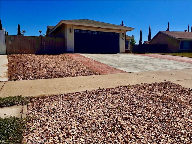 2969 Crestwood Pl, Riverside, CA 92503 - view of side of property with concrete driveway and an attached garage
