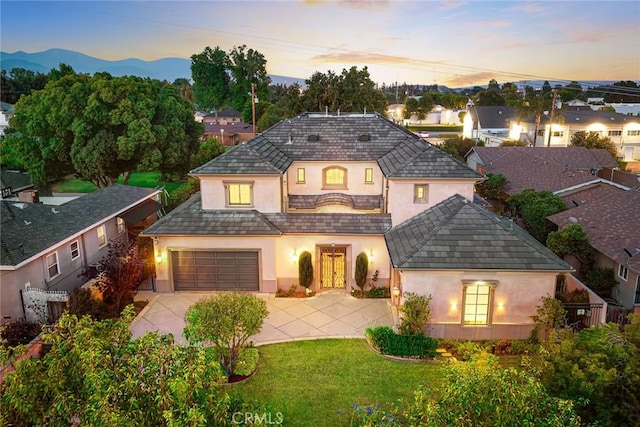 2600 S 2nd Ave, Arcadia, CA 91006 - view of front of home featuring stucco siding, concrete driveway, a lawn, a mountain view, and an attached garage