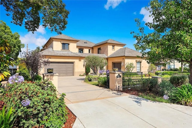 2600 S 2nd Ave, Arcadia, CA 91006 - view of front of property featuring stucco siding, a fenced front yard, driveway, a garage, and a tile roof
