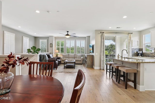3224 Lisbon Ln, Oxnard, CA 93036 - dining room featuring light wood-type flooring, recessed lighting, a ceiling fan, and baseboards